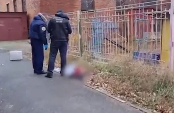 Küçədən parçalanmış qadın meyiti tapıldı (18+ görüntülər)