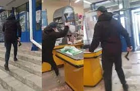 Baltalı şəxs bank filialını dağıdıb