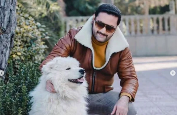 İzzət Bağırov iti ilə fotosessiya etdirdi - FOTOLAR  