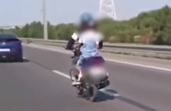 Bakıda övladını təhlükəli şəkildə daşıyan motosiklet sürücüsü saxlanılıb&nbsp;